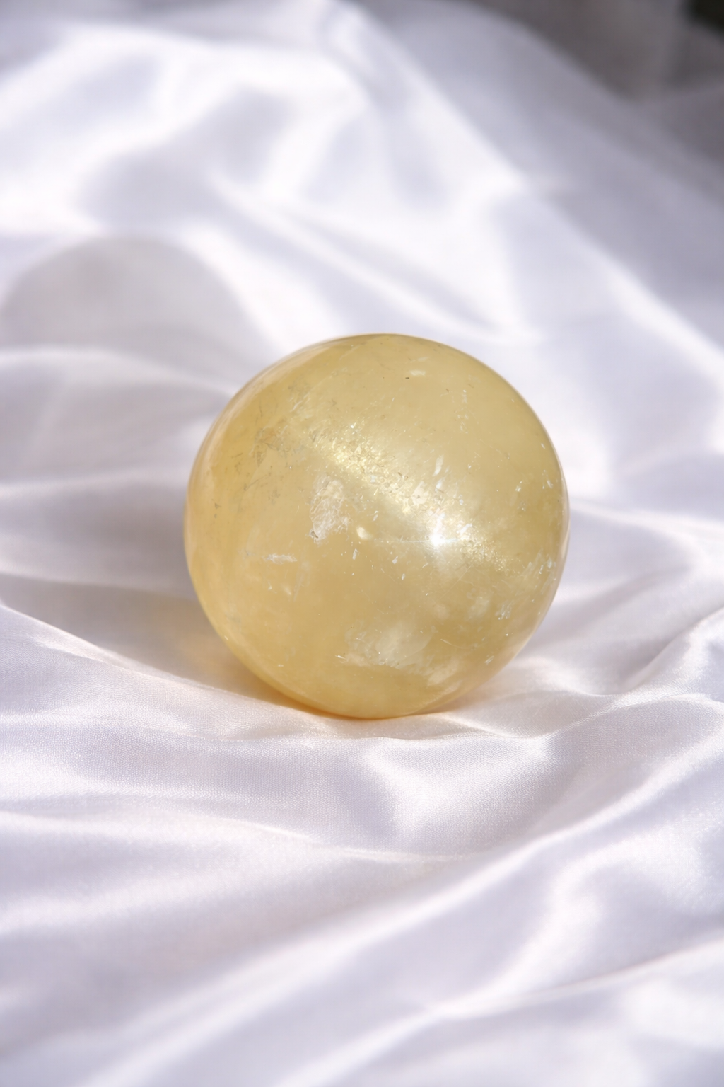 Honey calcite sphere