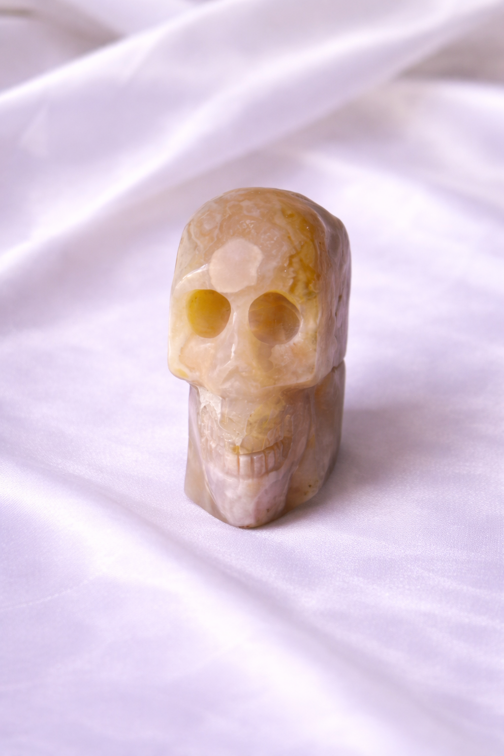 Flower agate heart made of skulls
